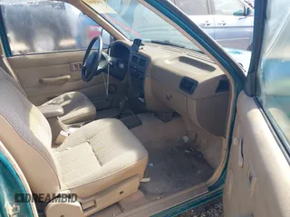 1997 Nissan Frontier XE z VIN 1N6SD16S8VC414870, wystawiony jako IAAI lot #41830303 z przebiegiem 103 158 mil mil oraz . Historia ofert i sprzedaży dostępna na DreamBid. Obrazek 5.