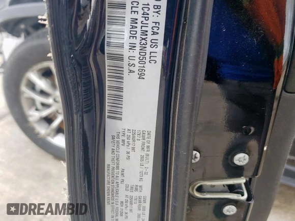 2022 Jeep Cherokee Latitude Lux with VIN 1C4PJLMX3ND501694, listed as a Copart auction lot 60551415 with 112,268 mi miles and Salvage title. Bid and sale history available at DreamBid. Image 14.