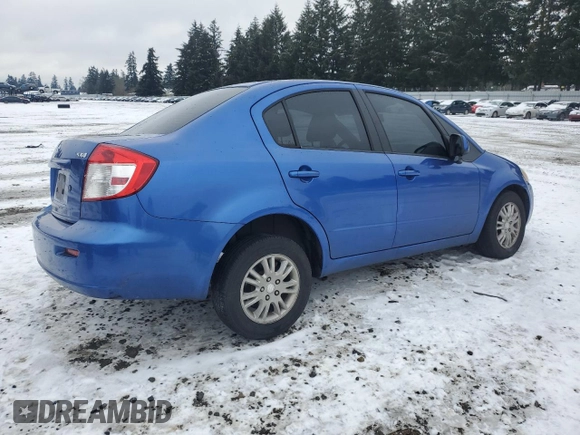 2012 Suzuki SX4 LE z VIN JS2YC5A30C6305375, wystawiony jako Copart lot #45429185 z przebiegiem 103 283 mil mil oraz Szkoda całkowita • Salvage title. Historia ofert i sprzedaży dostępna na DreamBid. Obrazek 3.