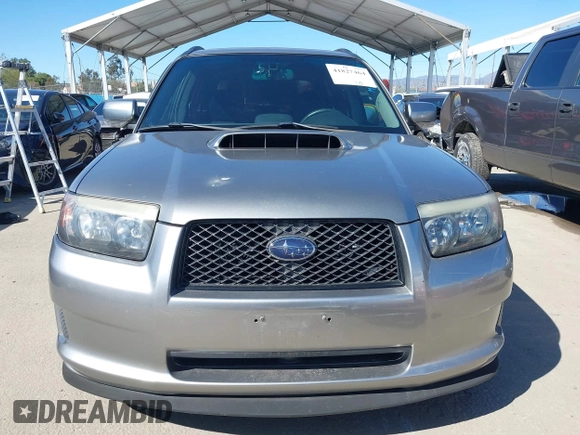 2007 Subaru Forester Sports XT with VIN JF1SG69687H733459, listed as a IAAI auction lot 41827464 with 139,943 mi miles. Bid and sale history available at carsss.com. Image 12.