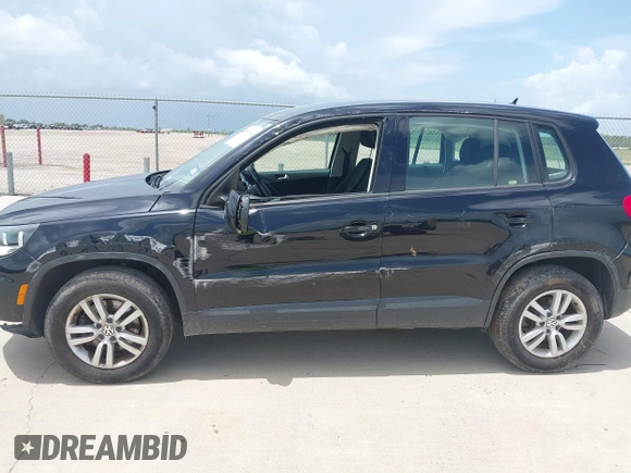 2014 Volkswagen Tiguan SE with VIN WVGAV3AX7EW549326, listed as a IAAI auction lot 42515906 with 102,221 mi miles and . Bid and sale history available at DreamBid. Image 6.