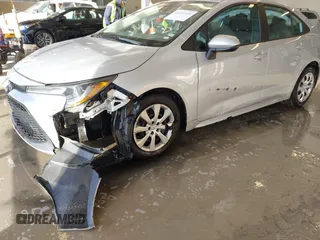 2021 Toyota Corolla LE with VIN 5YFEPMAE0MP214064, listed as a IAAI auction lot 41631520 with 77,396 mi miles and . Bid and sale history available at DreamBid. Image 6.