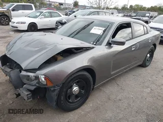 2012 Dodge Charger Police with VIN 2C3CDXAT9CH248013, listed as a IAAI auction lot 41728966 with 158,933 mi miles. Bid and sale history available at carsss.com. Image 2.