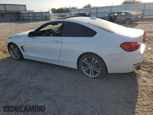 2015 BMW 4 Series 428i with VIN WBA3N3C59FK233053, listed as a Copart auction lot 52651415 with 165,218 mi miles and Salvage Title. Bid and sale history available at DreamBid. Image 2.