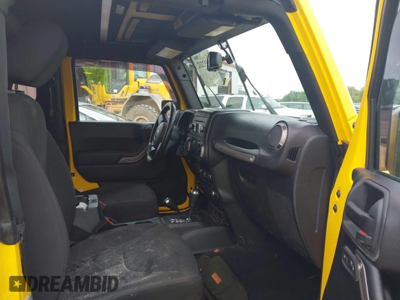 2015 Jeep Wrangler Freedom Edition with VIN 1C4AJWAG1FL652522, listed as a IAAI auction lot 42592232 with Not provided miles and . Bid and sale history available at DreamBid. Image 5.