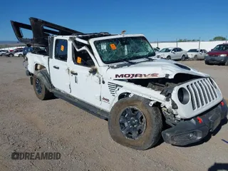 2021 Jeep Gladiator Mojave with VIN 1C6JJTEG5ML529206, listed as a IAAI auction lot 39566766 with Not Provided miles and . Bid and sale history available at DreamBid. Image 1.