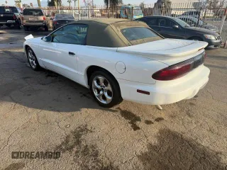 1997 Pontiac Firebird with VIN 2G2FS32K3V2232171, listed as a Copart auction lot 46740375 with 64,745 mi miles and Salvage Title. Bid and sale history available at carsss.com. Image 3.