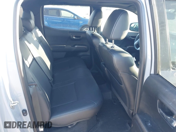 2018 Toyota Tacoma SR5 with VIN 3TMDZ5BN3JM054548, listed as a IAAI auction lot 42038480 with 122,242 mi miles and . Bid and sale history available at DreamBid. Image 8.