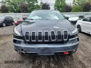 2014 Jeep Cherokee Trailhawk with VIN 1C4PJMBS3EW127928, listed as a Copart auction lot 63825865 with 172,712 mi miles and Salvage title. Bid and sale history available at DreamBid. Image 5.