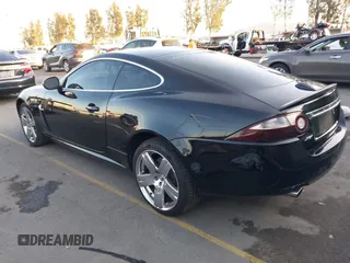 2008 Jaguar XK with VIN SAJWA43B985B23987, listed as a IAAI auction lot 41197091 with 54,803 mi miles. Bid and sale history available at carsss.com. Image 3.