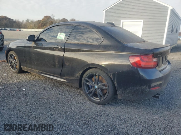 2016 BMW 2 Series M235i xDrive with VIN WBA1J9C57GV371986, listed as a Copart auction lot 77871604 with 0 mi miles and Salvage Title. Bid and sale history available at carsss.com. Image 2.