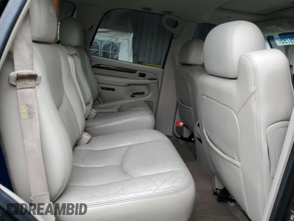 2004 Cadillac Escalade z VIN 1GYEK63N74R232309, wystawiony jako Copart lot #53099795 z przebiegiem 222 698 mil mil oraz Szkoda całkowita • Salvage title. Historia ofert i sprzedaży dostępna na DreamBid. Obrazek 11.