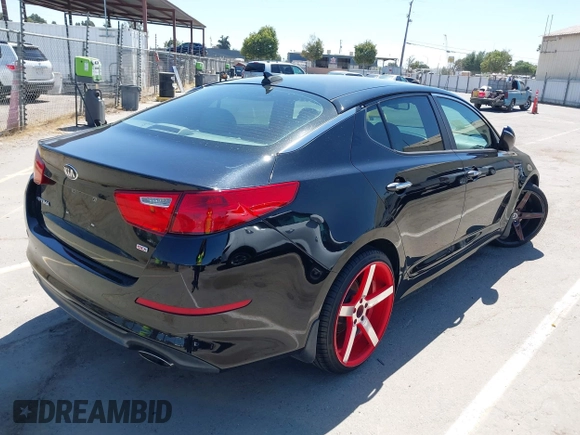 2015 Kia Optima LX z VIN 5XXGM4A76FG507580, wystawiony jako IAAI lot #42544939 z przebiegiem 99 804 mil mil oraz . Historia ofert i sprzedaży dostępna na DreamBid. Obrazek 4.