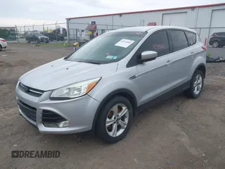 2014 Ford Escape SE z VIN 1FMCU9GX9EUC35713, wystawiony jako IAAI lot #42323161 z przebiegiem 169 393 mil mil oraz . Historia ofert i sprzedaży dostępna na DreamBid. Obrazek 2.