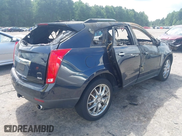 2014 Cadillac SRX Performance Collection with VIN 3GYFNCE31ES599632, listed as a IAAI auction lot 42757876 with Not provided miles and . Bid and sale history available at DreamBid. Image 4.