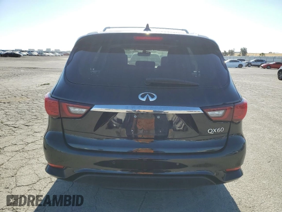 2019 Infiniti QX60 Pure с VIN 5N1DL0MM3KC506036, выставлен на аукционе Copart как лот 57265965 с пробегом 123 889 миль миль и Списание • Salvage title. История ставок и продаж доступна на DreamBid. Изображение 6.
