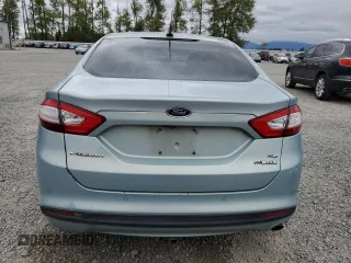 2013 Ford Fusion SE Hybrid with VIN 3FA6P0LU1DR244336, listed as a Copart auction lot 54673405 with 144,180 mi miles and Salvage Title. Bid and sale history available at carsss.com. Image 6.