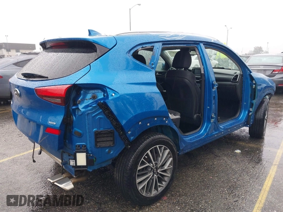 2019 Hyundai Tucson Ultimate with VIN KM8J3CAL9KU990451, listed as a IAAI auction lot 41546822 with 83,536 mi miles. Bid and sale history available at carsss.com. Image 4.