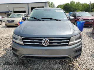 2018 Volkswagen Tiguan S with VIN 3VV0B7AXXJM131760, listed as a Copart auction lot 58831685 with 124,431 mi miles and Salvage title. Bid and sale history available at DreamBid. Image 5.