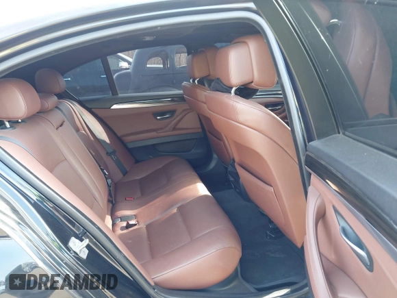 2013 BMW 5 Series 535i xDrive with VIN WBAFU7C50DDU77411, listed as a IAAI auction lot 41796299 with 138,944 mi miles and . Bid and sale history available at carsss.com. Image 8.