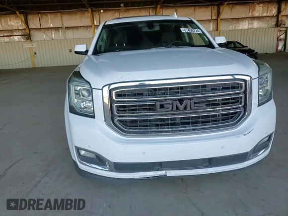 2017 GMC Yukon XL SLE with VIN 1GKS1FKC8HR222023, listed as a Copart auction lot 67496724 with 125,155 mi miles and Salvage Title. Bid and sale history available at carsss.com. Image 12.
