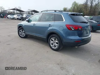 2015 Mazda CX-9 Touring with VIN JM3TB3CVXF0460959, listed as a IAAI auction lot 41940912 with 166,674 mi miles and . Bid and sale history available at DreamBid. Image 3.