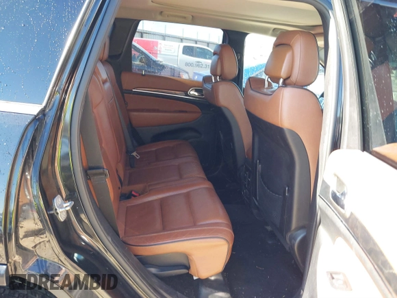 2013 Jeep Grand Cherokee Overland with VIN 1C4RJFCT1DC654653, listed as a IAAI auction lot 41826619 with 124,283 mi miles. Bid and sale history available at carsss.com. Image 8.