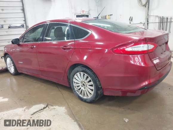 2013 Ford Fusion SE Hybrid with VIN 3FA6P0LU9DR150396, listed as a IAAI auction lot 42080329 with 195,665 mi miles. Bid and sale history available at carsss.com. Image 3.