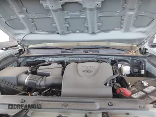 2022 Toyota Tacoma SR with VIN 3TMCZ5ANXNM479025, listed as a IAAI auction lot 42280363 with 29,650 mi miles and . Bid and sale history available at DreamBid. Image 10.