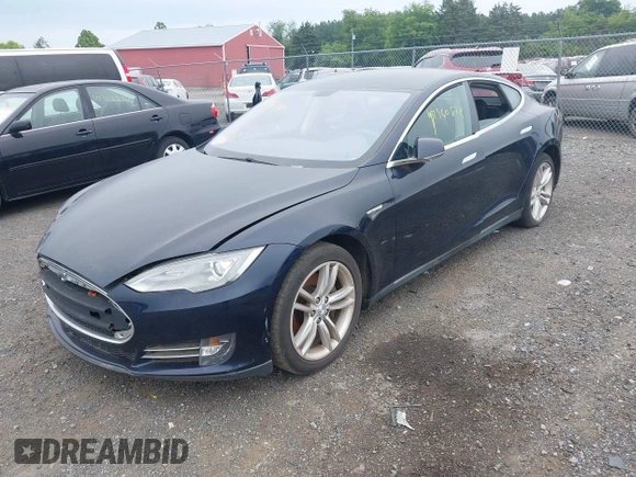 2014 Tesla Model S 60 with VIN 5YJSA1H19EFP32063, listed as a IAAI auction lot 42360872 with 103,495 mi miles and . Bid and sale history available at DreamBid. Image 2.