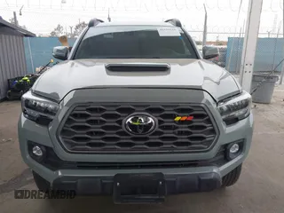 2023 Toyota Tacoma SR z VIN 3TMCZ5AN1PM602567, wystawiony jako IAAI lot #42355648 z przebiegiem 32 472 mil mil oraz . Historia ofert i sprzedaży dostępna na DreamBid. Obrazek 12.