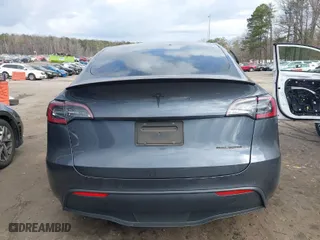 2020 Tesla Model Y Long Range with VIN 5YJYGDEFXLF001469, listed as a IAAI auction lot 41715853 with 34,483 mi miles. Bid and sale history available at carsss.com. Image 16.