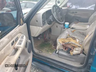 2001 GMC Yukon SLT z VIN 1GKEK13TX1J191325, wystawiony jako IAAI lot #42306665 z przebiegiem Nie podano mil oraz . Historia ofert i sprzedaży dostępna na DreamBid. Obrazek 5.