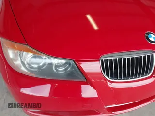 2007 BMW 3 Series 335i with VIN WBAVB73587P100572, listed as a IAAI auction lot 41409539 with 124,650 mi miles. Bid and sale history available at carsss.com. Image 6.