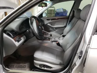 2003 BMW 3 Series 325xi with VIN WBAEU33453PM52318, listed as a Copart auction lot 52195535 with 104,018 mi miles and Salvage Title. Bid and sale history available at carsss.com. Image 7.