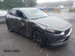 2024 Mazda CX-30 S Select Sport with VIN 3MVDMBBM9RM681964, listed as a IAAI auction lot 42499955 with 19,506 mi miles and . Bid and sale history available at DreamBid. Image 1.
