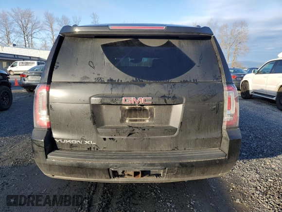 2015 GMC Yukon XL SLT with VIN 1GKS2HKC4FR697416, listed as a Copart auction lot 87887925 with 236,772 mi miles and Salvage Title. Bid and sale history available at carsss.com. Image 6.