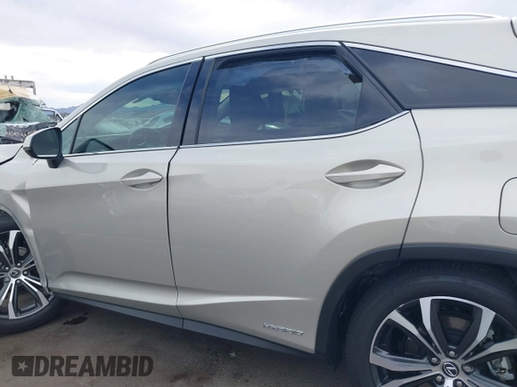 2021 Lexus RX 450h with VIN 2T2HGMDA0MC067228, listed as a IAAI auction lot 41818836 with 28,850 mi miles and . Bid and sale history available at DreamBid. Image 14.