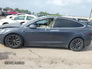 2018 Tesla Model X 75D with VIN 5YJXCDE21JF139712, listed as a IAAI auction lot 41905326 with Not Provided miles and . Bid and sale history available at carsss.com. Image 14.