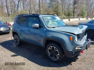 2017 Jeep Renegade Trailhawk z VIN ZACCJBCB8HPE88025, wystawiony jako IAAI lot #41868431 z przebiegiem 96 835 mil mil oraz . Historia ofert i sprzedaży dostępna na DreamBid. Obrazek 1.