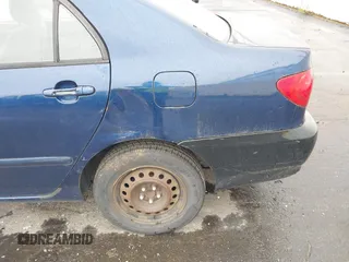 2003 Toyota Corolla CE with VIN 1NXBR32E13Z052044, listed as a IAAI auction lot 42013132 with 230,952 mi miles and . Bid and sale history available at DreamBid. Image 6.