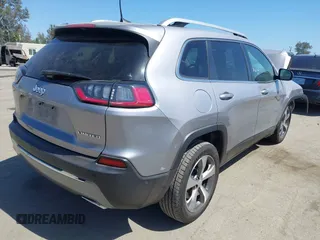 2021 Jeep Cherokee Limited with VIN 1C4PJLDX0MD100067, listed as a IAAI auction lot 42273029 with 84,579 mi miles and . Bid and sale history available at DreamBid. Image 4.