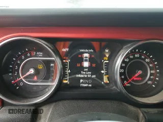 2020 Jeep Gladiator Rubicon z VIN 1C6JJTBG9LL150356, wystawiony jako Copart lot #50449445 z przebiegiem 77 849 mil mil oraz Szkoda całkowita • Salvage title. Historia ofert i sprzedaży dostępna na DreamBid. Obrazek 9.