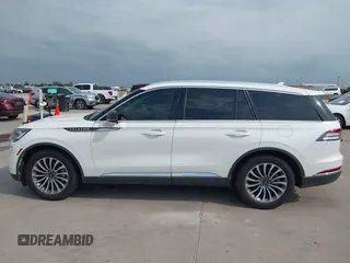 2020 Lincoln Aviator Reserve with VIN 5LM5J7WC1LGL28593, listed as a IAAI auction lot 42137327 with 83,114 mi miles and . Bid and sale history available at DreamBid. Image 14.