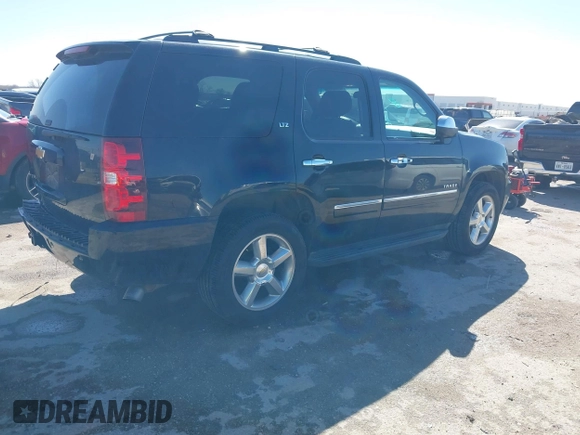 2013 Chevrolet Tahoe LTZ with VIN 1GNSKCE0XDR350970, listed as a IAAI auction lot 41704253 with 126,653 mi miles and . Bid and sale history available at DreamBid. Image 4.