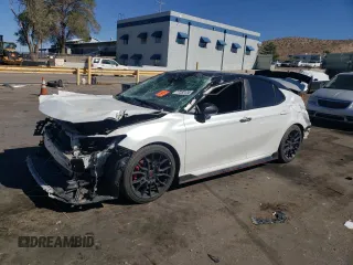 2022 Toyota Camry TRD with VIN 4T1KZ1AK8NU068305, listed as a Copart auction lot 77232174 with Not provided miles and Salvage title. Bid and sale history available at DreamBid. Image 1.