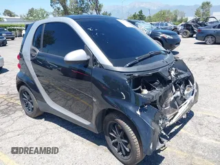 2008 Smart fortwo Pure z VIN WMEEJ31X38K168460, wystawiony jako IAAI lot #42220858 z przebiegiem 101 630 mil mil oraz . Historia ofert i sprzedaży dostępna na DreamBid. Obrazek 1.
