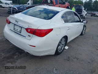 2015 Infiniti Q50 Sport z VIN JN1BV7AP4FM330923, wystawiony jako IAAI lot #42562750 z przebiegiem 89 953 mil mil oraz . Historia ofert i sprzedaży dostępna na DreamBid. Obrazek 4.