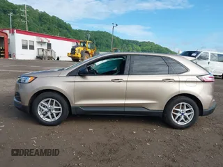 2021 Ford Edge SE with VIN 2FMPK4G90MBA19667, listed as a IAAI auction lot 42215758 with 27,496 mi miles and . Bid and sale history available at DreamBid. Image 14.
