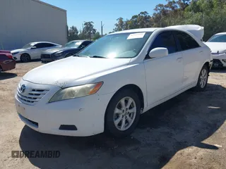 2009 Toyota Camry with VIN 4T1BE46K19U851560, listed as a IAAI auction lot 41812628 with 244,313 mi miles. Bid and sale history available at carsss.com. Image 2.